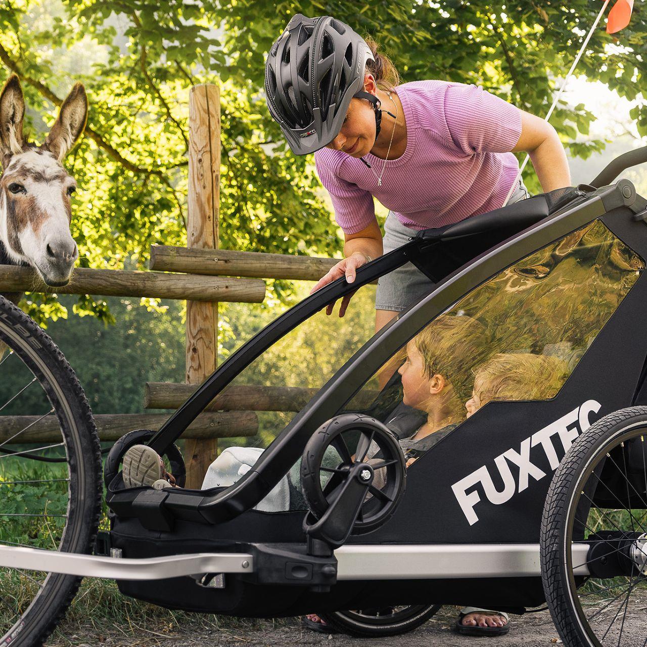 Przyczepka rowerowa/jogger FUXTEC FX-FA1-SET-PURPUR z kolem do joggera